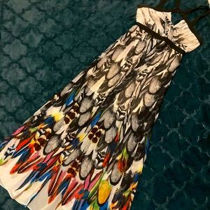 Feathered Bebe Maxi Dress with cross strap bodice